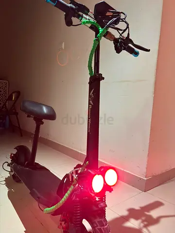Used Electric Scooter with Seat, Dual Rear Lights, Suspension - Good Condition