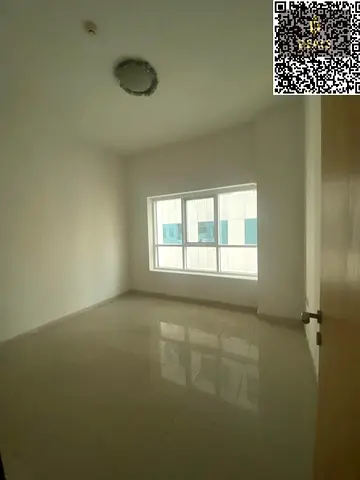 ✨ فرصة لا تُفوّت! شقة غرفتين وصالة واسعة في أبراج عجمان بيرل A2 بمساحة 1400 قدم، فقط **38 ألف** بـ4 دفعات.