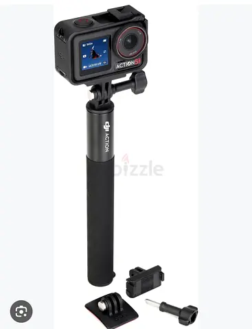 DJI Action 5 adventure combo style action camera with handle and mounts (used)