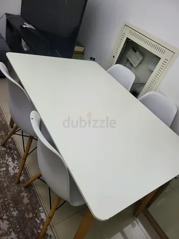 White Scandinavian-style Dining Table with 4 Chairs - Good Condition