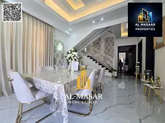Corner villa in Al-Yasmeen featuring two floors and a roof terrace; includes central air conditionin