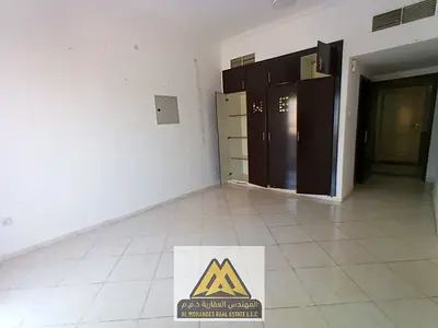 Annual rental: 1-bedroom apartment with a living room and balcony in Al Rashidiya 3, Ajman. Central