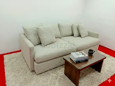 Premium quality crate and barrel beige color three seater sofa