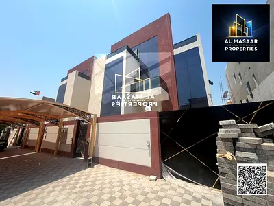 Modern 3-story villa with 7 bedrooms, elevator, and rooftop terrace. Located near the Saudi German
