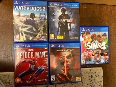 Bundle of 5 PS4 Games — Uncharted 4, Spider-Man, Tekken 7, Watch Dogs 2, The Sims 4