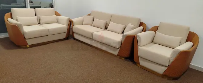 (Original Price 10,999) Urgent selling 3-piece beige and tan sofa set with modern metal frame.