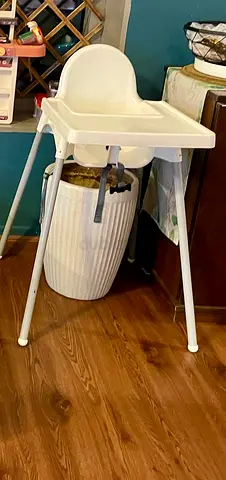 Simple white baby high chair with tray — clean sturdy
