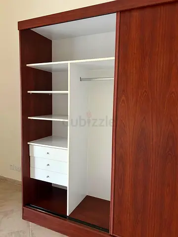 Used 2-door slider Wooden Wardrobe with Shelves and Drawers - Good Condition