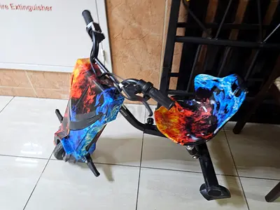 Used flame-design drift trike / electric drift kart - good condition, new