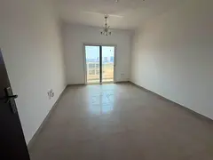 Upscale two-bedroom apartment with a living room for annual rent in the Muwailih area, featuring thr