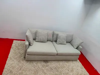 Expensive quality crate and barrel beige color 3 seater sofa