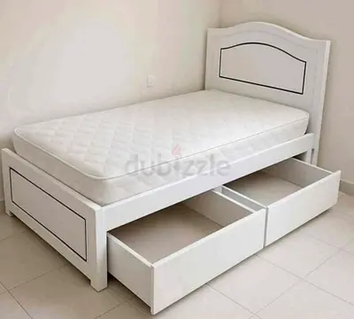 Single white wooden bed with storage drawers and mattress.  190x90