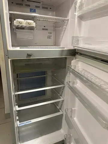 Large freezer/refrigerator compartment — good working condition, clean interior