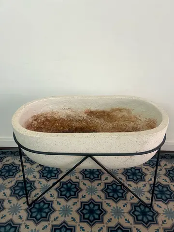 Stone terrazzo planter with metal stand - oval decorative pot