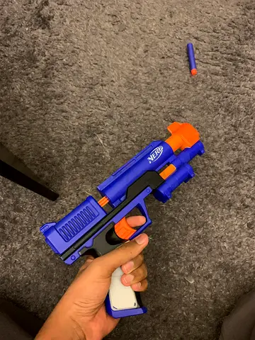 blue Nerf-style dart blaster with one dart