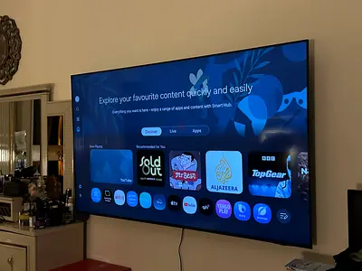 75” Samsung Smart LED UHD TV mounted, good working condition (with stand)