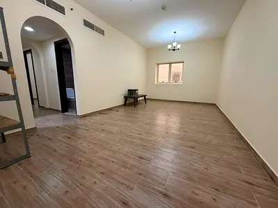 Beautiful two-bedroom apartment with a living room for annual rent in the Muwailih area, featuring a spacious living room, three bathrooms with built-