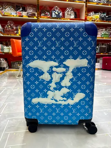 Louis Vuitton Horizon 55 suitcase is from the Monogram