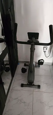 Compact stationary upright exercise bike only for 100 Aed