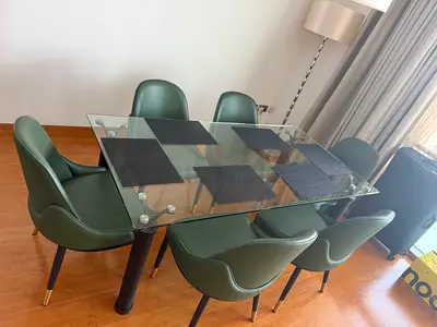 Glass dining table modern asthetic finish with 6 leather chairs