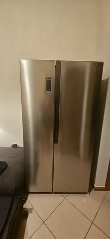 Large stainless steel side-by-side refrigerator - good condition