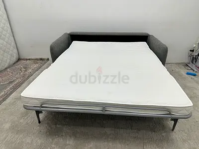 Like new condition marina home two seater sofabed