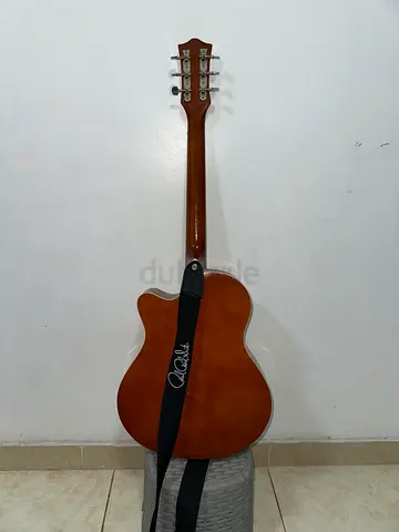 Used Acoustic Guitar with Strap - Good Condition
