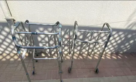 Two lightweight adjustable walkers — good working condition
