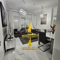 Luxury apartment, second occupancy, one bedroom and living room with a balcony and open view. Ajman,