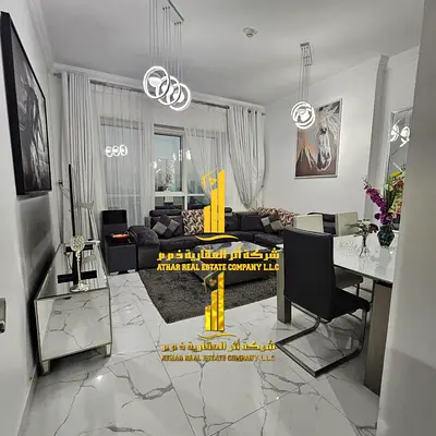 Luxury apartment, second occupancy, one bedroom and living room with a balcony and open view. Ajman, Oasis Tower. for monthly rent.