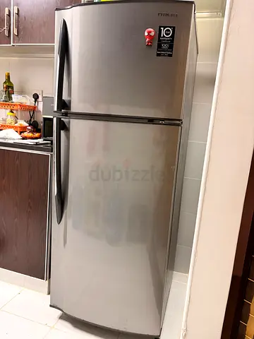 Nikai 2-Door Stainless Steel Refrigerator - Good Condition. 10 year compressor warranty. 2023 make