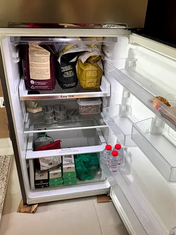 Double-door refrigerator in good working condition