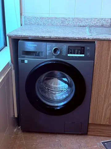 Samsung front-load washing machine — good condition, works well