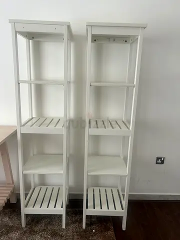 Pair of white open bookshelf shelving units – tall storage racks