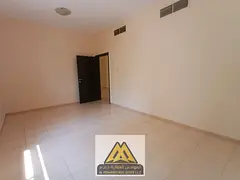 Annual rental: 1-bedroom apartment with a living room in Al Nuaimiya 2, Ajman. Balcony, central A/C,