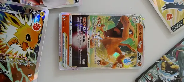 Assorted Pokémon TCG Rare  Holo Cards (Charizard VMAX, Jolteon, more)