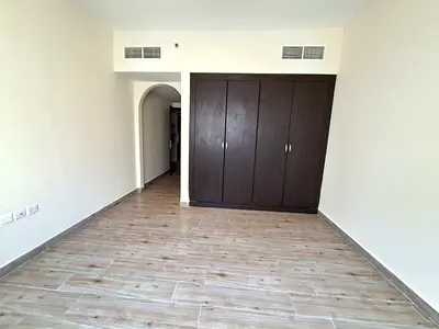 Like a brand new appartment 1bhk big hall with belcony and wall drop parking included muwaileh Community prime location sharajh