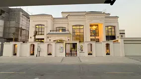 A villa designed like a palace, featuring two floors, a rooftop terrace, an elevator, and a large sw