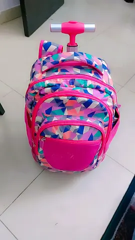 Pink geometric pattern kids trolley backpack with retractable handle