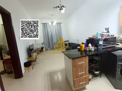 One bedroom and living room for sale in City Tower | Open view overlooking Khalifa Street and Safeer Mall | Currently rented for 29,000 AED | 29-month