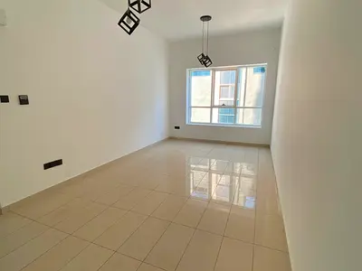 1BHK with balcony, kitchen, and sea view, plus parking.