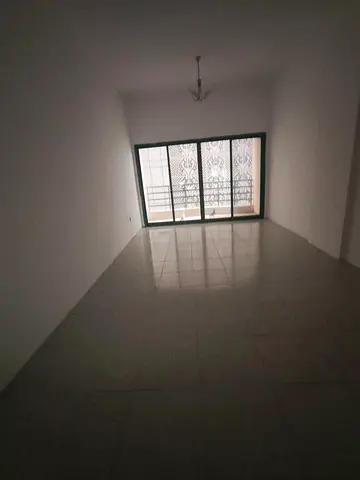 For rent in Al Qasba (Al Majaz 3), Sharjah: 3BR apartment, master room, 3 bathrooms, central AC & gas, 2 balconies. AED 42,000/year, 15 days free.