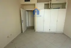 2BR apartment for sale in Al Maha Tower, Al Majaz 2. 1,500 sq.ft., open view, 3 bathrooms. Final pri