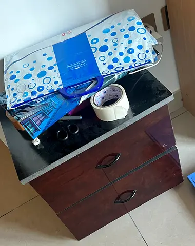Dark wood bedside cabinet with two drawers - good condition