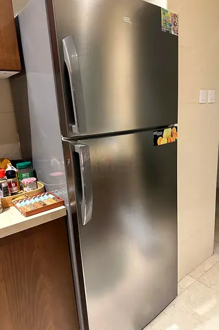 Good condition top-freezer refrigerator - stainless steel finish