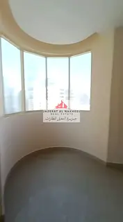 Two-bedroom apartment with a living room in Al Nahda, with an excellent area.