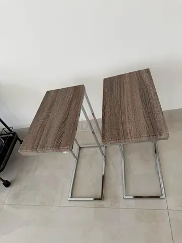 Pair of modern side tables with chrome legs