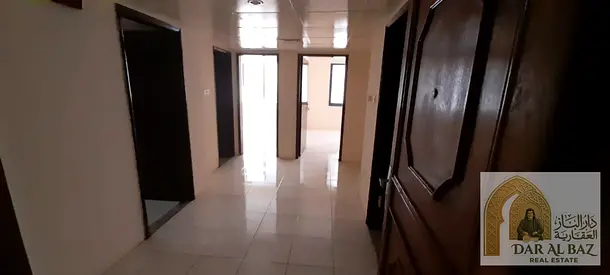 Two-bedroom apartment with a living room for annual rent in Al Majaz 1, with two bathrooms. A suitable opportunity for family living in an excellent l