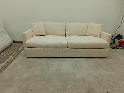 Authentic crate and barrel beige color three seater sofa