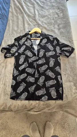 Black short-sleeve button-up shirt with white leaf print - size S